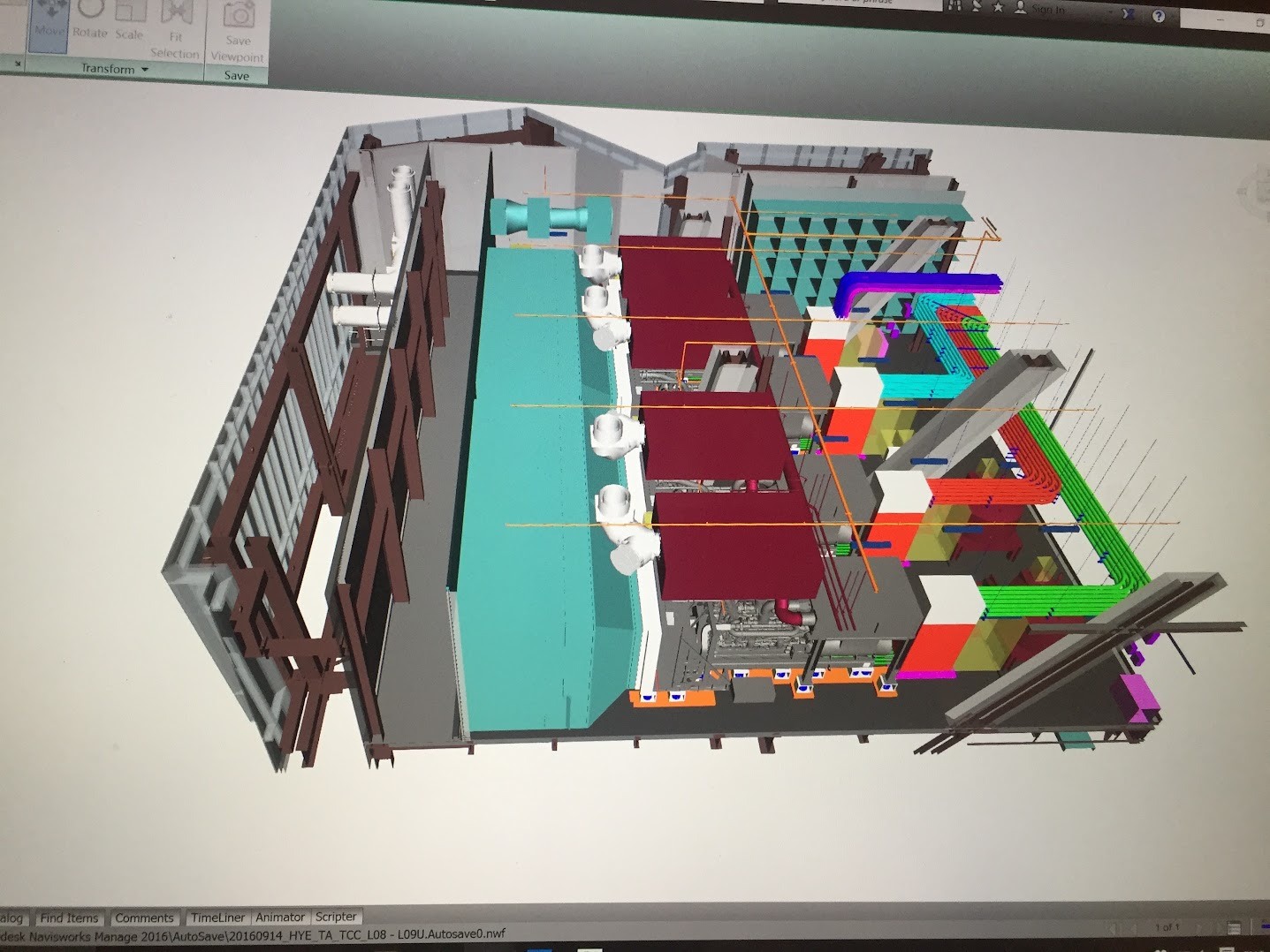 A Navisworks coordination model on a computer screen: colour-coded steel framing, ductwork, piping and equipment for one mechanical floor of a tower.
